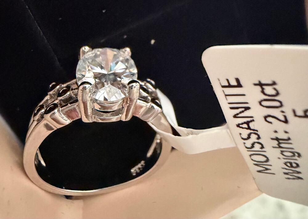 Moissanite 1.5 karat  Center Stone on sterling silver.